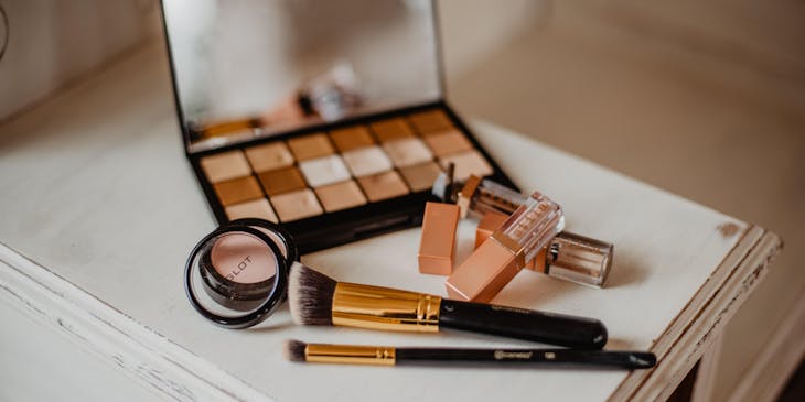 Makeup products on a table.
