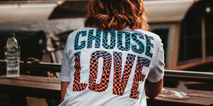 A woman wearing a T-shirt with a sublimation print.