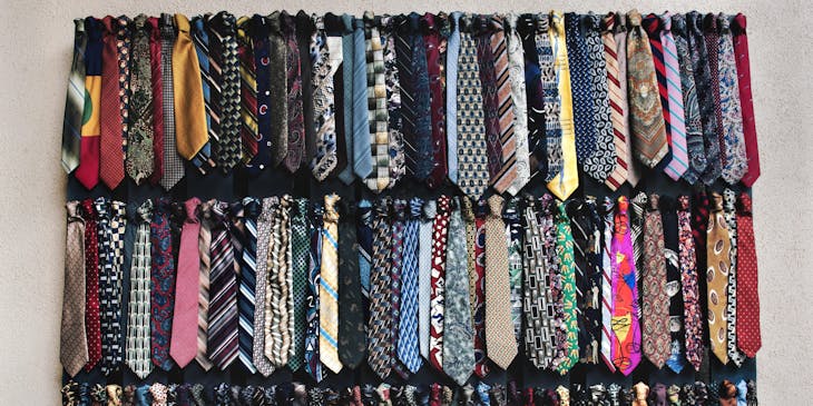 An assortment of ties stocked by a tie business.