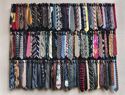 An assortment of ties stocked by a tie business.