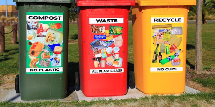 Brightly colored bins used for waste management.