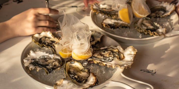A luxurious meal table setting at a fine dining restaurant.