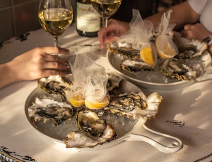 A luxurious meal table setting at a fine dining restaurant.
