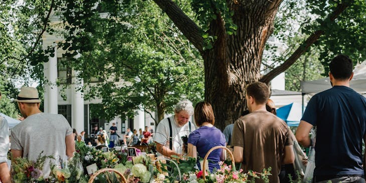 A local market brimming with customers and small businesses.