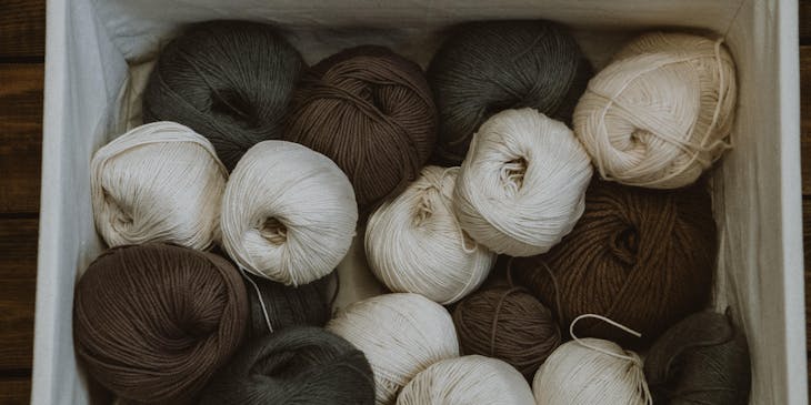 A basket of yarn for crochet.
