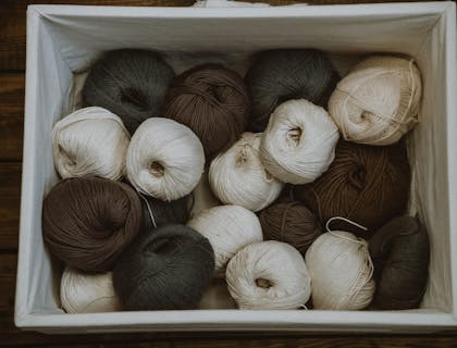 A basket of yarn for crochet.