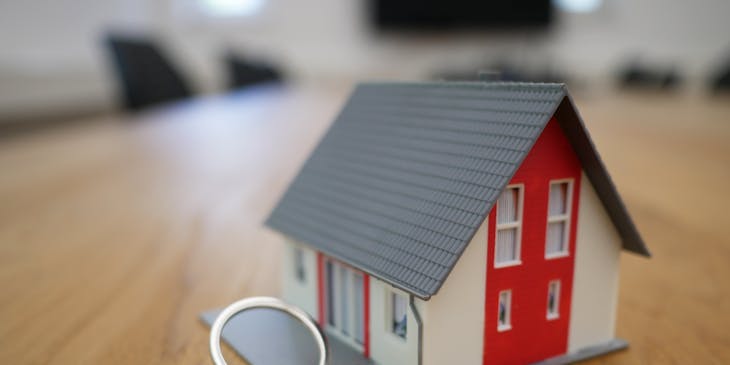A miniature house on keychain.