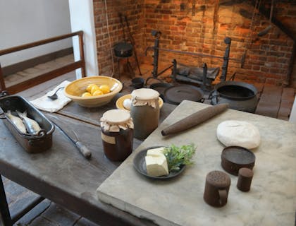 Ingredients and utensils resting on a 1700s table in Virginia.