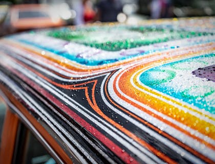 An airbrushed car is put on display