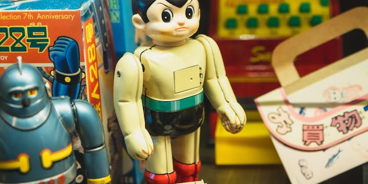 Anime toys on a shelf in an anime store.