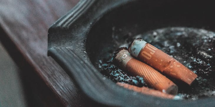 Cigarette buds in an ashtray.
