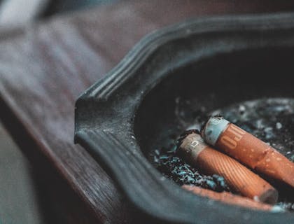 Cigarette buds in an ashtray.