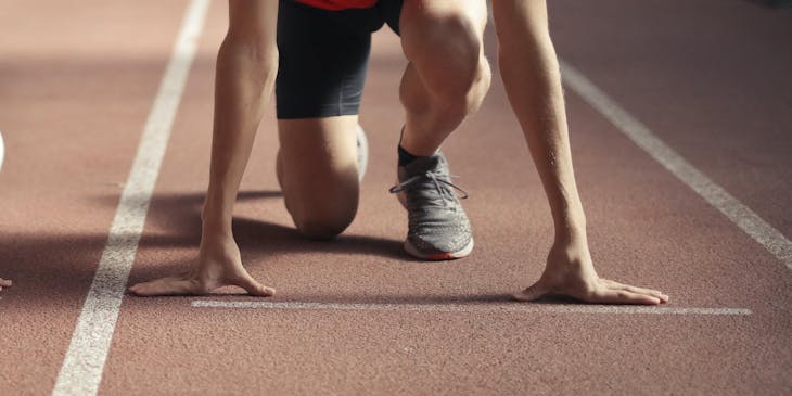 An athlete lining up for an athletics meet.