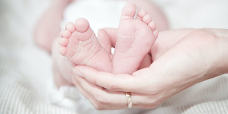 Close up photograph of a baby's feet.