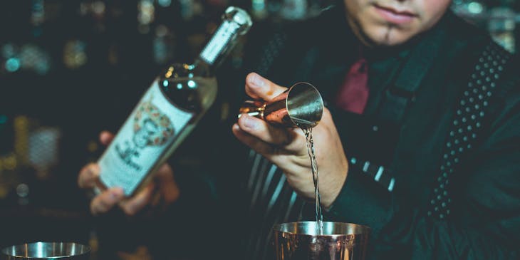 Bartender pouring a drink