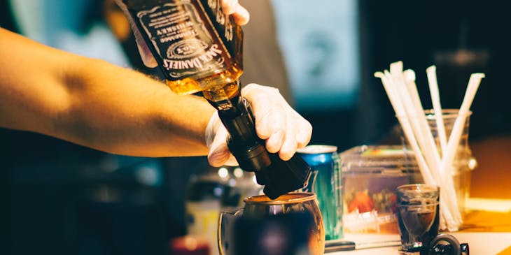 Bartender pouring an alcoholic drink