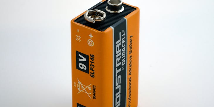 Orange and black Duracell alkaline battery set against a white backdrop.