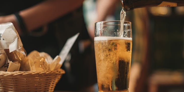 Beer being poured into a glass.