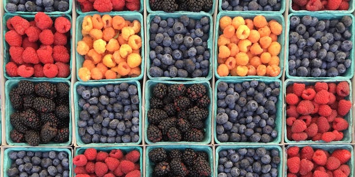 Trays of different types of berries.