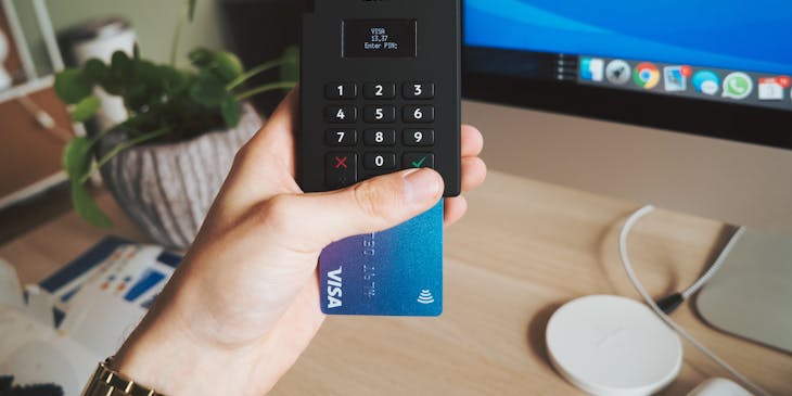 A person paying their bills.