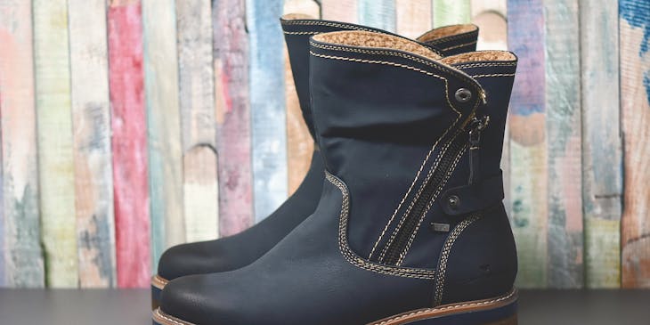 Winter boots on display at a boot business.