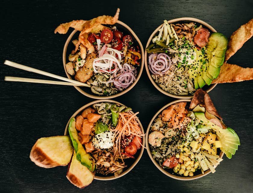 An assortment of savory bowls of food served at a bowl restaurant.
