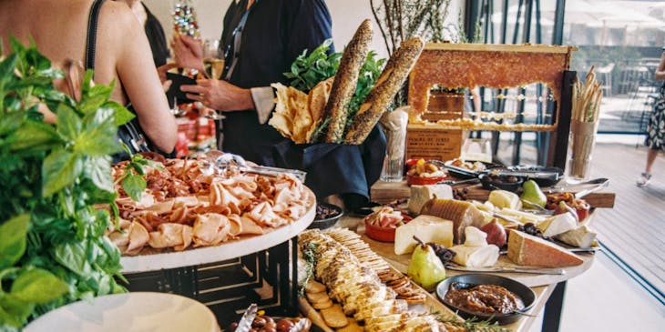 Food dishes on a table in a buffet restaurant.