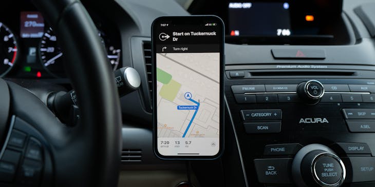 A car accessory used to mount a cell phone to a car's dashboard.
