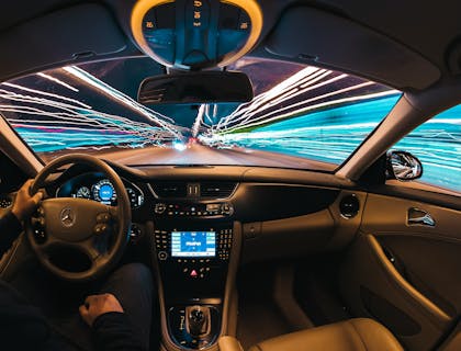 Interior of of car while person driving.