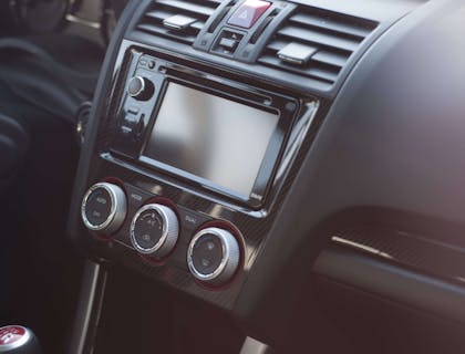 Close-up of a dashboard with a car stereo.