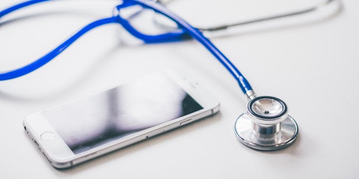 A phone awaits diagnosis before repairs.