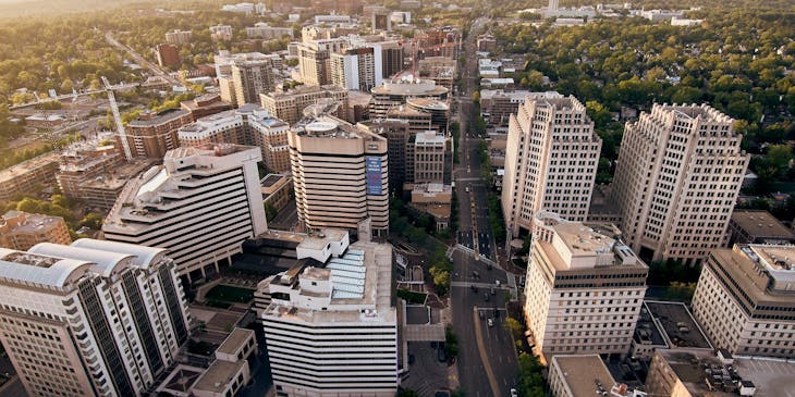 An aerial view of an urban complex managed by a commercial real estate business.