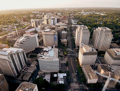 An aerial view of an urban complex managed by a commercial real estate business.