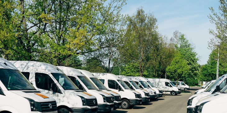 Sprinter vans lined up at commercial truck dealer: