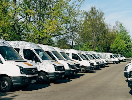 Sprinter vans lined up at commercial truck dealer:
