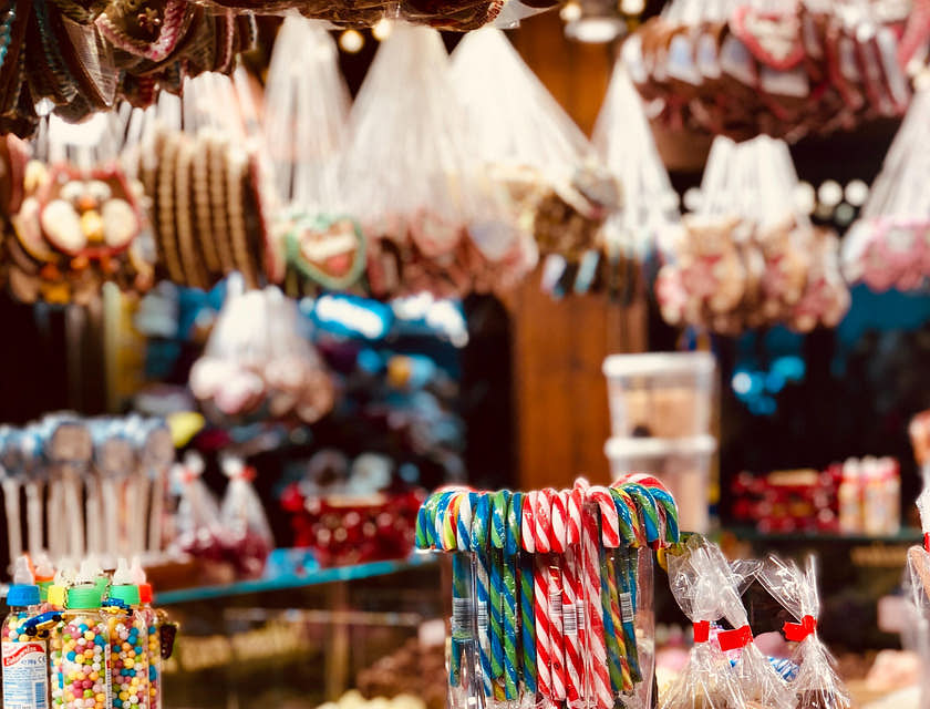 A concession stand business with displays of candies and treats.
