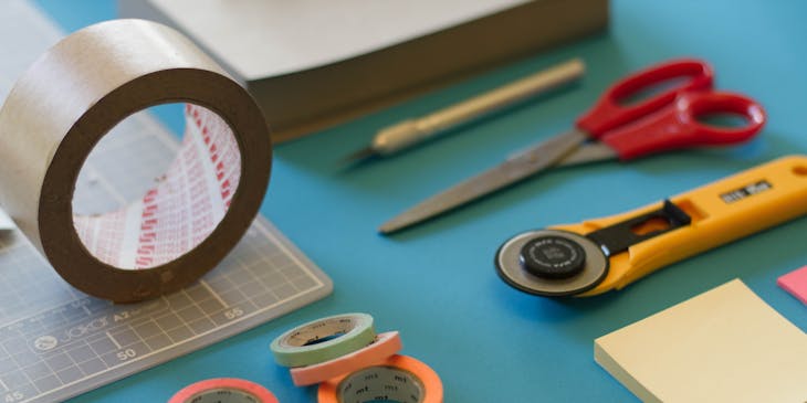 Craft business supplies laid out on a table.