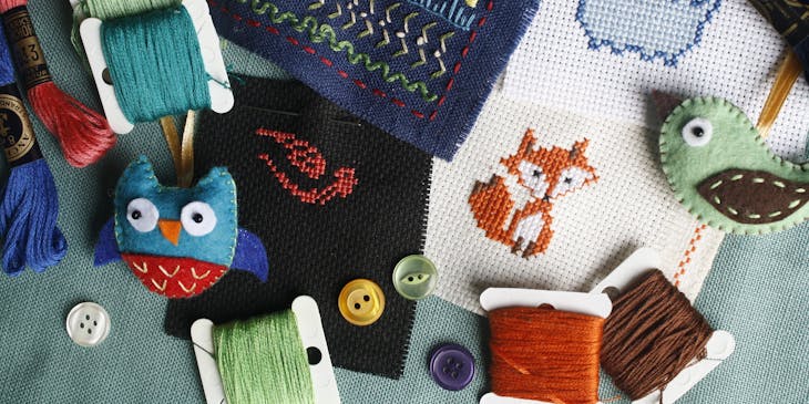 various embroidery supplies spread out