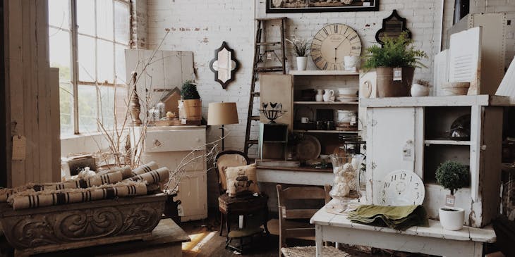 The interior of a curio shop that sells furniture and other vintage items.