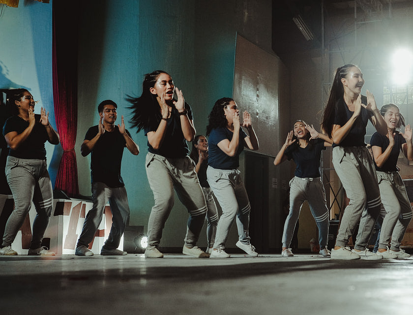 A group of girls rehearsing in a dance studio.