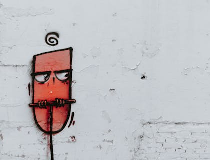 Dank graffiti on a white wall.