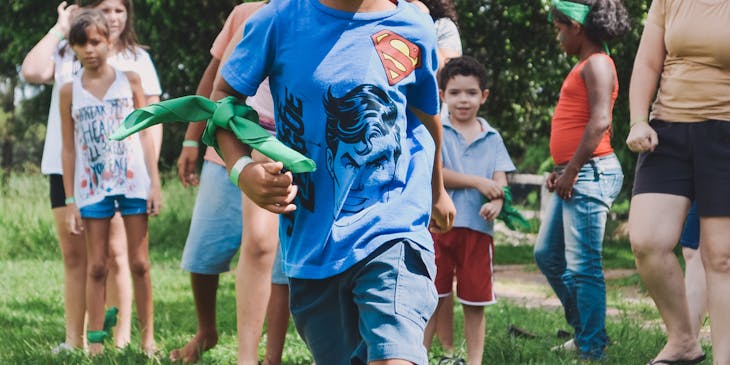 Children playing an outdoor game at day camp.