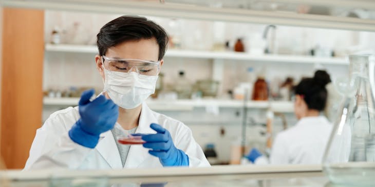 Person doing a test in a diagnostic services laboratory.