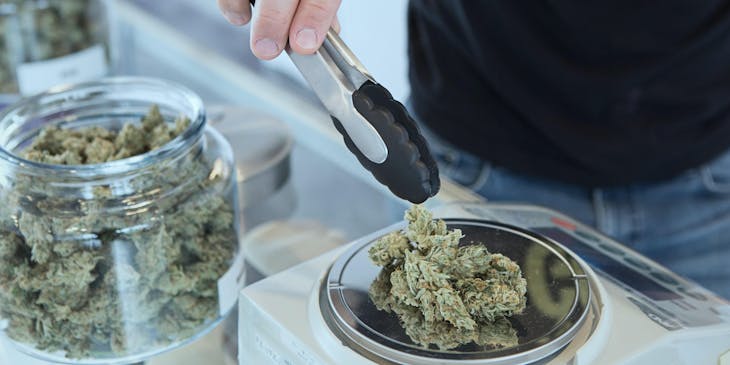weed being weighed at a dispensary business
