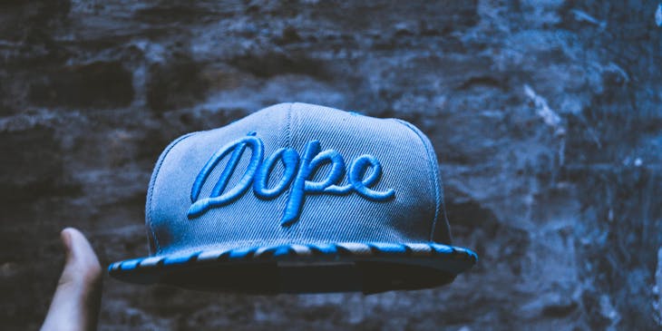 A cap with a dope business name.