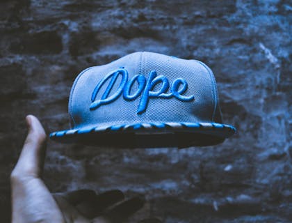 A cap with a dope business name.