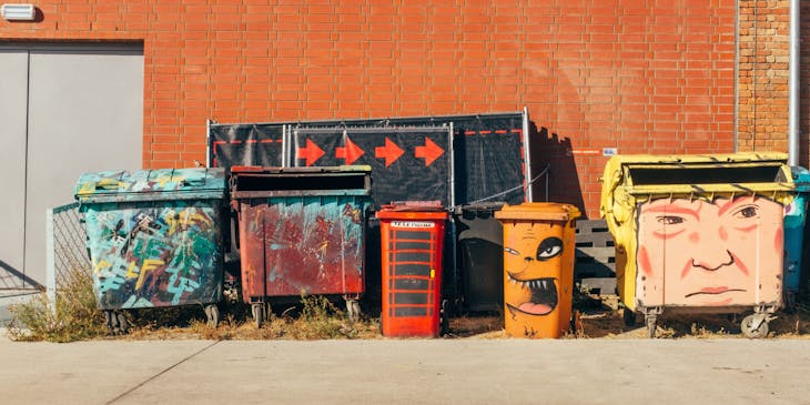 Colorful dumpsters of all sizes.