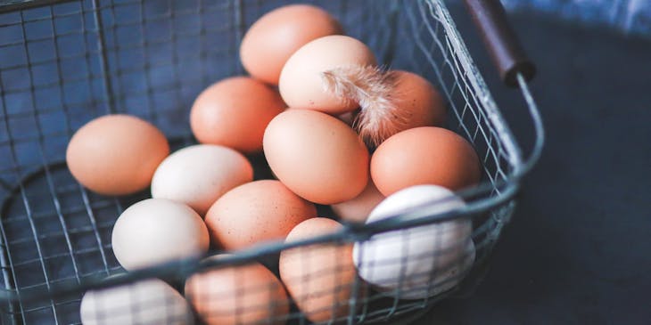 a basket of freshly laid eggs from an egg business