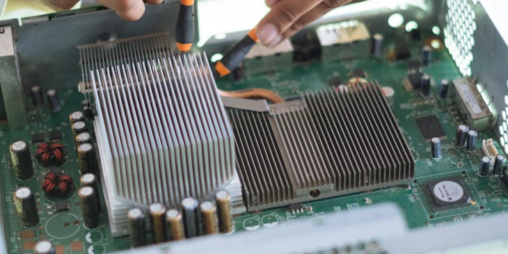 Man at electronics repair shop.
