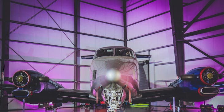 elite private jet parked in a hangar